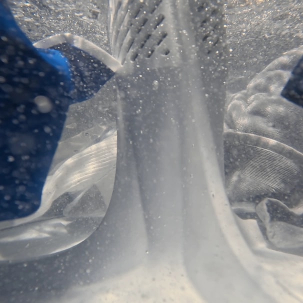 Clothes and water in the middle of a wash cycle