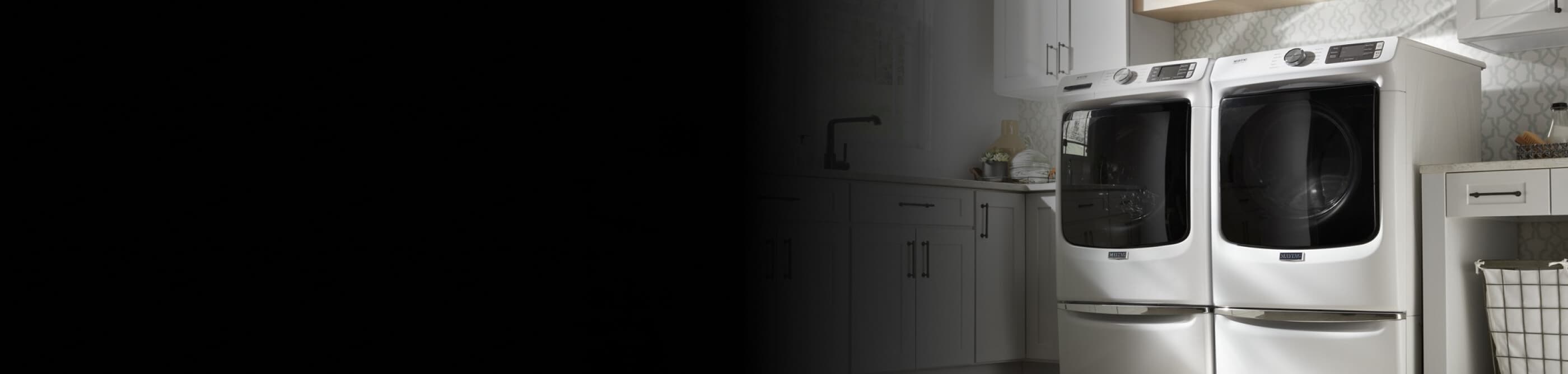 Maytag® washer and dryer in a modern laundry room