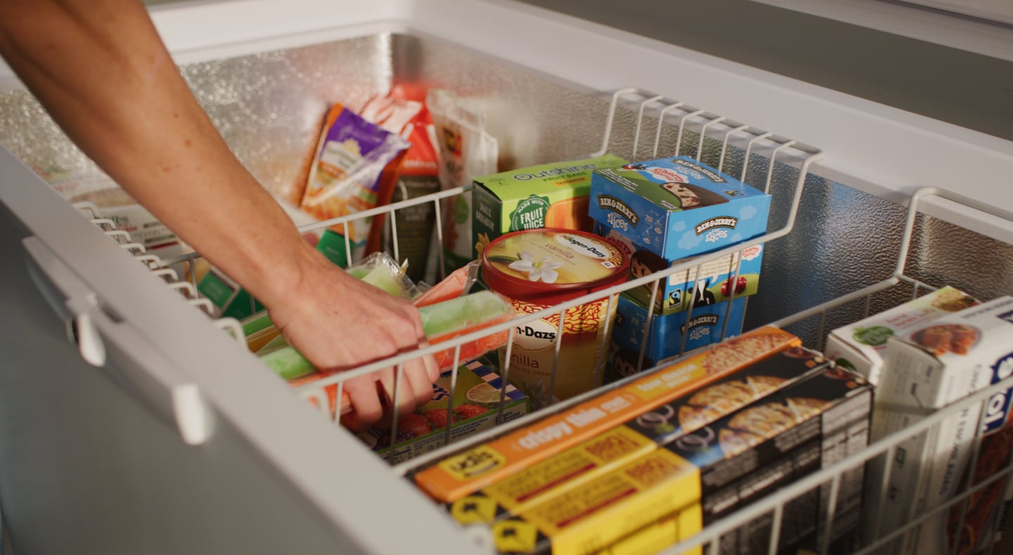 Frozen food organized in a freezer Frozen food organized in a freezer