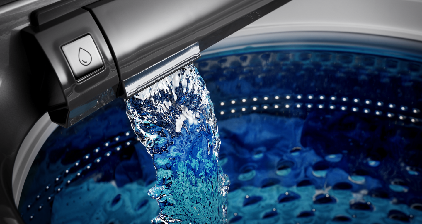 Water pouring into Maytag® washing machine Water pouring into Maytag® washing machine