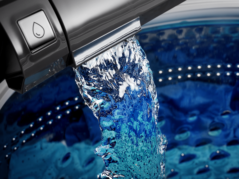 Water pouring into Maytag® washing machine Water pouring into Maytag® washing machine