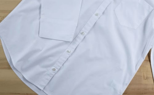 Close-up of a white button-up shirt